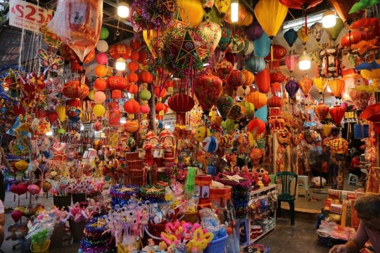 Hang Ma is filled with vibrant colors and decorations, featuring everything from paper money to intricate lanterns.