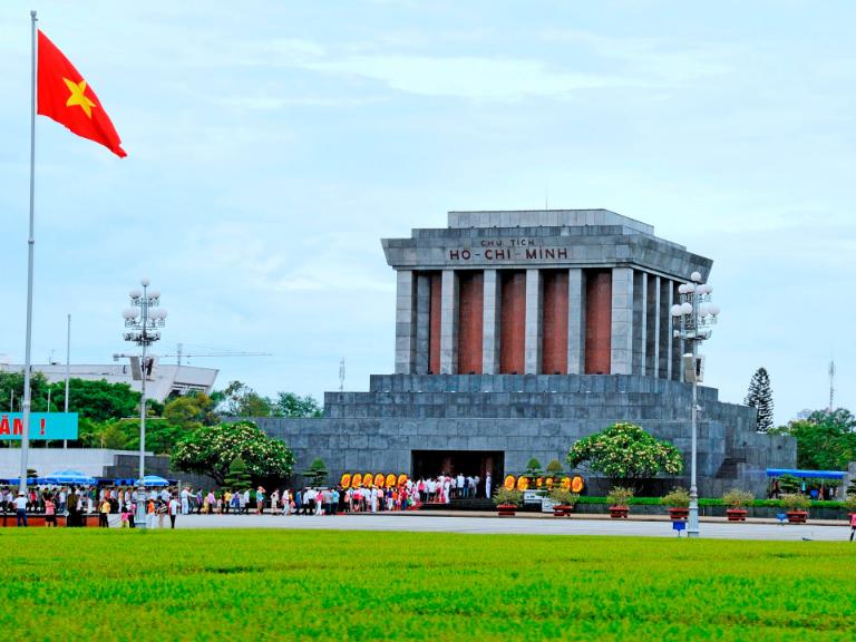 The mausoleum is surrounded by well-kept lawns and fragrant flower beds