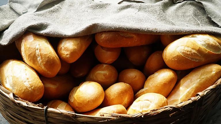 The bread used for banh mi is a long, crusty baguette