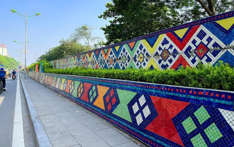 The mural is composed of ceramic tiles, which were specifically chosen for their durability and vibrant colors