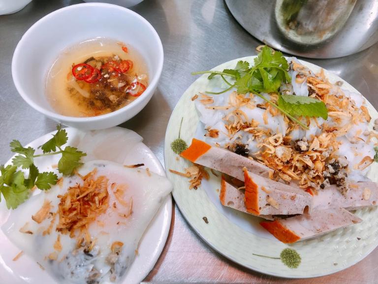 Banh cuon are delicate steamed rice rolls filled with ground pork, mushrooms, and shallots.