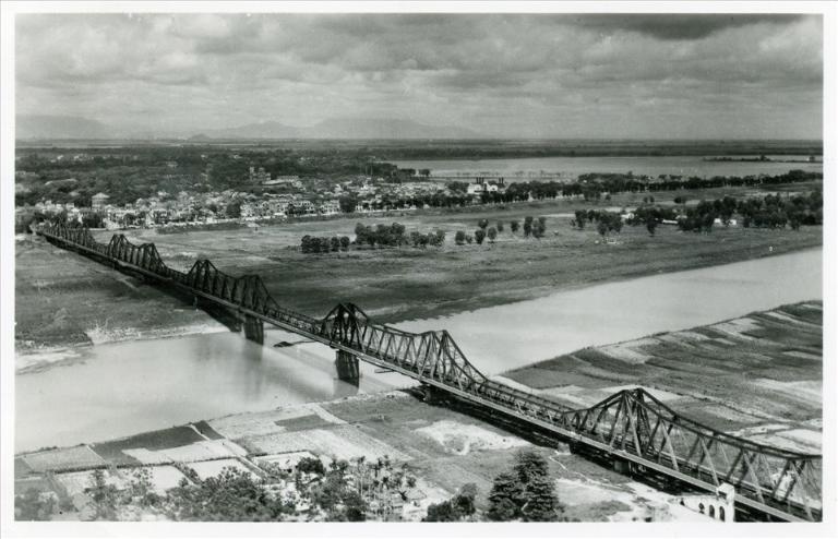 Stretched across the Red River running through Hanoi, the Long Bien Bridge was completed in the years 1898-1902