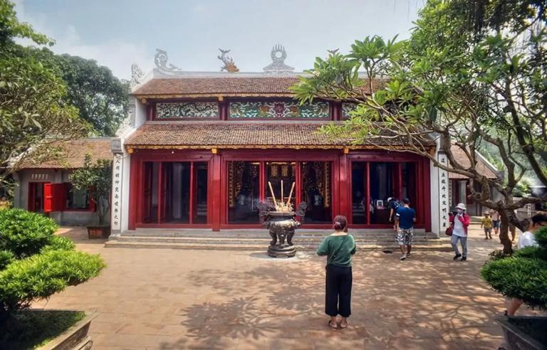 The main temple building is a striking blend of traditional and symbolic design elements.