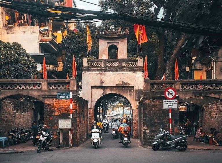 The Old City Gate bears a strong Chinese influence, evident in the curved roof and ornamental details on the archways