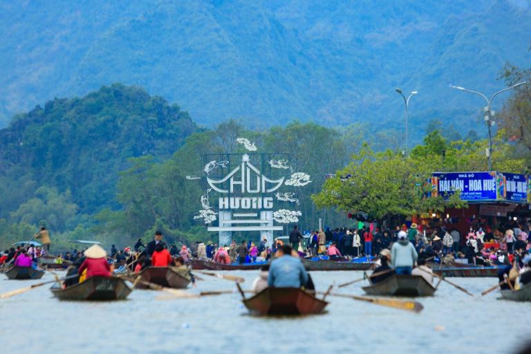 The boat ride offers a peaceful journey through stunning karst landscapes.