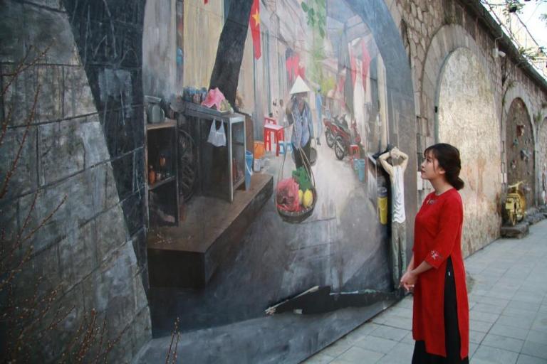 Phung Hung Mural Street can be enjoyed at any time