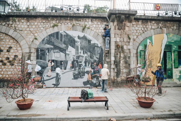 Walking along Phung Hung Mural Street is like flipping through a vibrant storybook