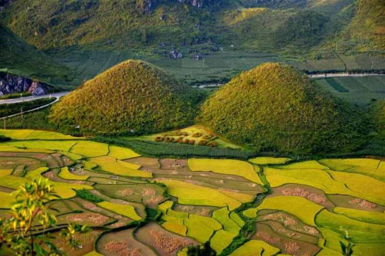 Another stunning aspect of the landscape is the terraced rice fields that cascade down the hillsides