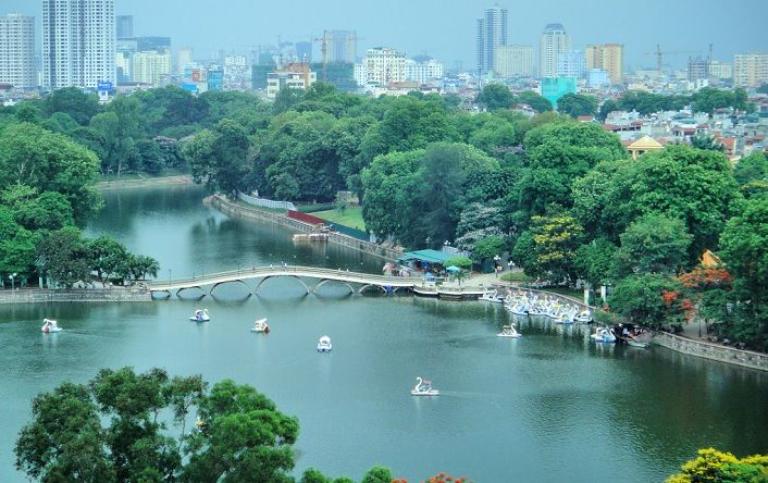 At the center of Thu Le Park lies a picturesque lake, often considered the heart of the park