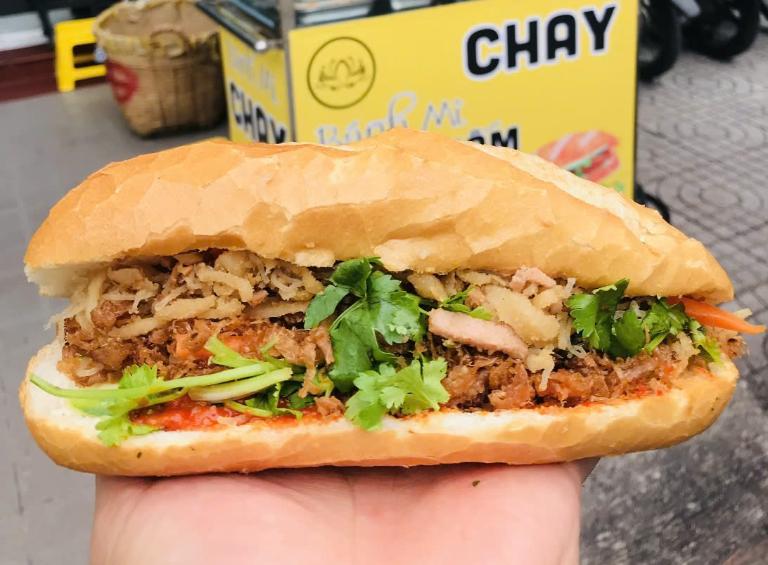 The Banh Mi Chay is packed with tofu, pickled vegetables, cilantro, and a delicious soy-based sauce. 