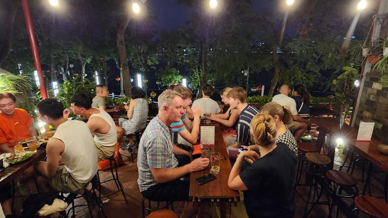 This bar offers a beautiful backdrop for savoring artisan beers beside the gorgeous Truc Bach Lake