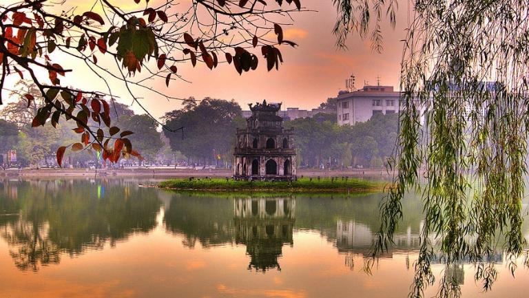 From nearby locations like Hoan Kiem Lake, you might walk, ride a taxi or motorbike