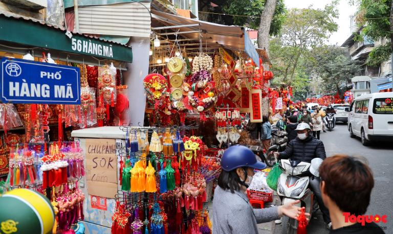 Hang Ma Street explodes into a frenzy of activity in the weeks before Tet