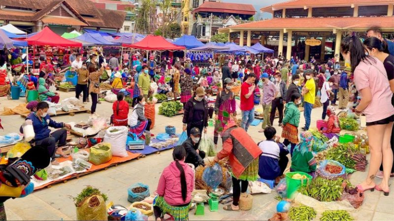 Nghi Lo market is the heartbeat of the town, where locals gather to buy and sell goods