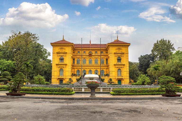 Presidential Palace, a grand French colonial building that was the official residence of Ho Chi Minh.