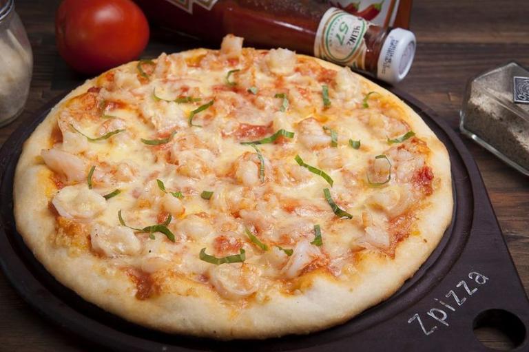 Zpizza is well-known for its mouthwatering pizzas loaded with strong tastes ranging from beef to seafood.