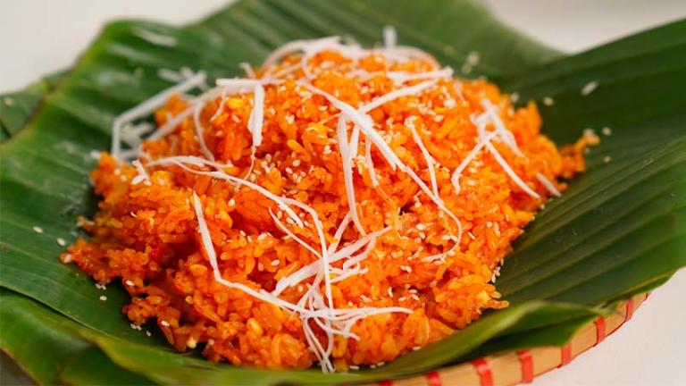 This dish is traditionally served during festivals and celebrations, symbolizing good luck and prosperity. 