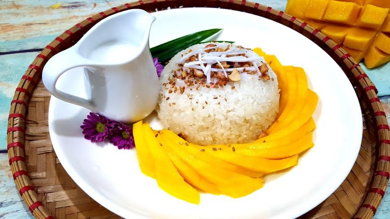 This dish combines sticky rice softened with coconut milk and topped with fresh mango slices