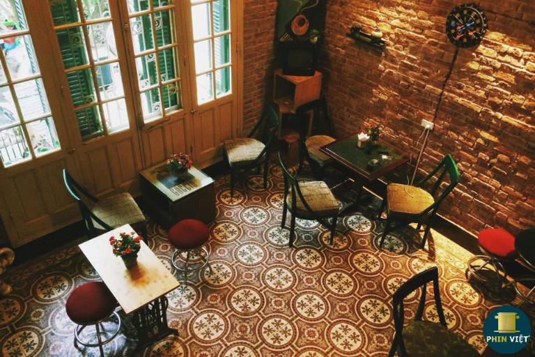 Loading T Cafe exudes the old-world charm of Hanoi with warm tones, vintage tiled floors,