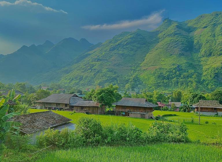 Du Gia Village stands out with its serene waterfalls, rice terraces, and rich culture.