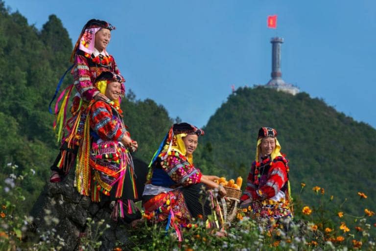 The Lo Lo people dwell beneath the flag tower, guardians of the nation's edge.