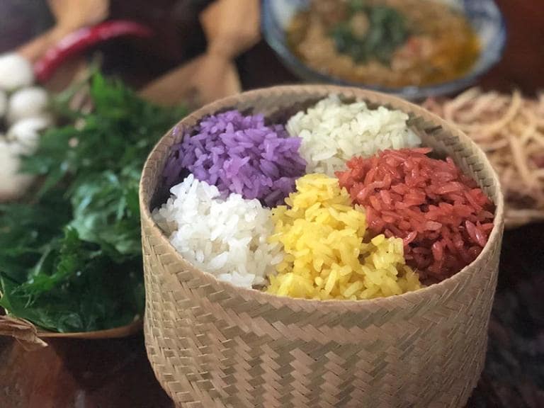 Xôi Ngũ Sắc, a colorful sticky rice, symbolizes harmony in life.