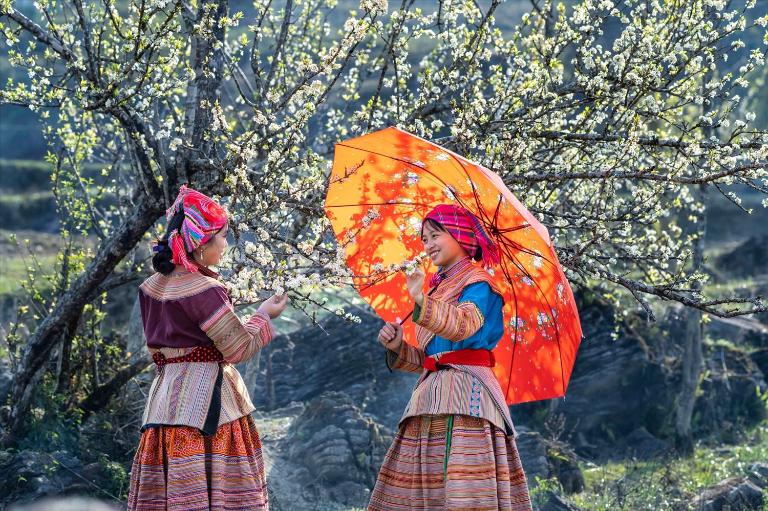 Experience the beauty of H'Mong culture by wearing traditional attire for photos