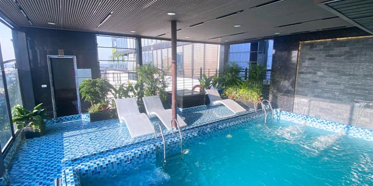 The hotel features a modern swimming pool with stunning views of the entire city.