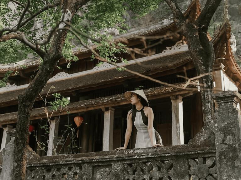 Ha Pagoda radiates serenity at the base of Ngoa Long Mountain, embodying Buddhist artistry.