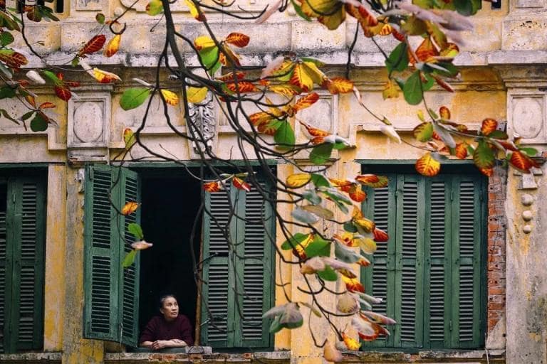 The balance of old and new in Hanoi is evident in its ancient streets beside modern skyscrapers.