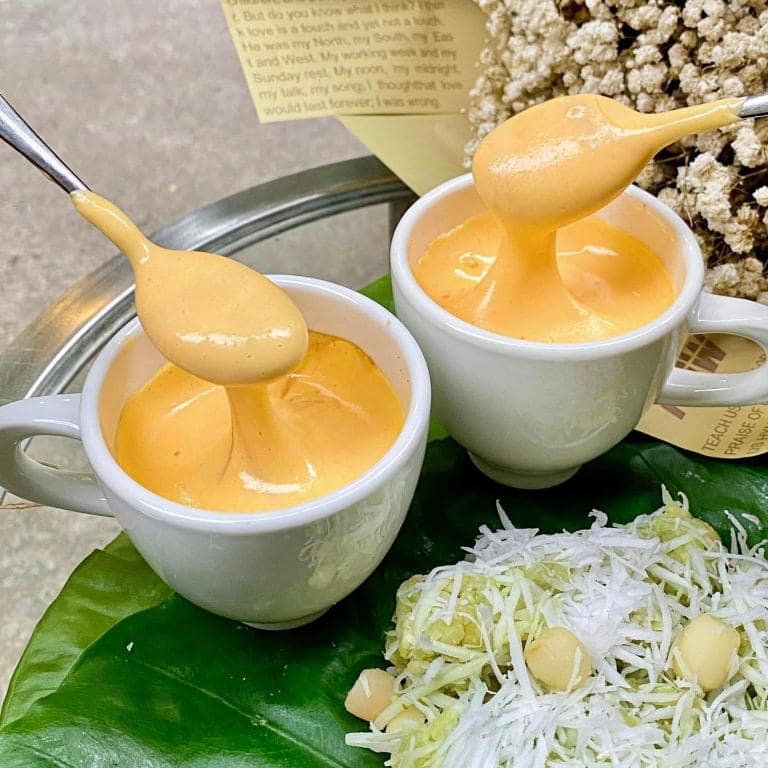 Egg coffee offers a creamy, rich taste, while sticky rice combines sweet, savory, and comforting flavors.