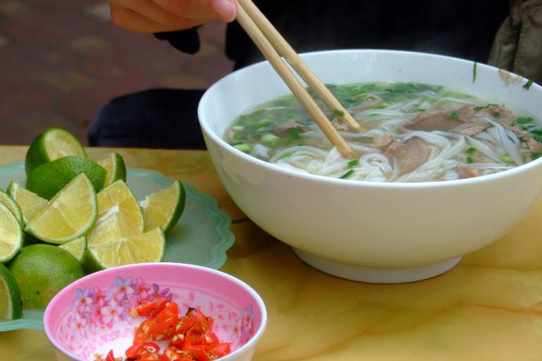 Hanoi’s pho features a fragrant broth, tender beef, and fresh herbs, offering a warm delight.