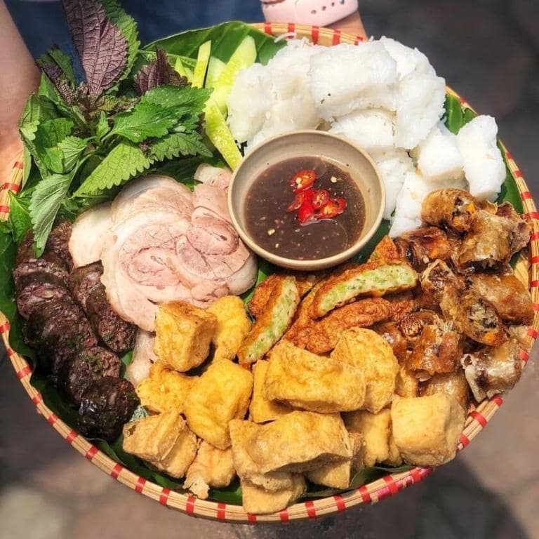 No Hanoi walking food tour is complete without trying bun dau mam tom, a flavorful local delicacy.