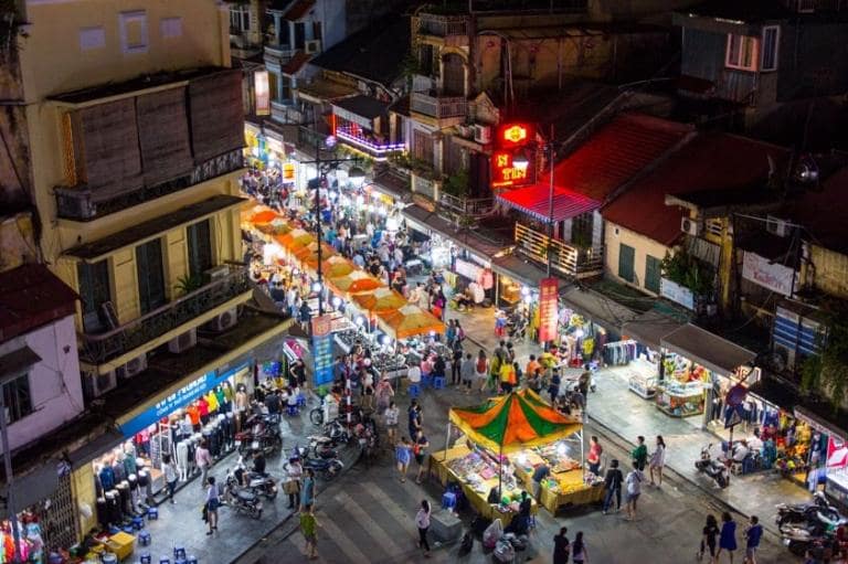 Hanoi's evening market offers a vibrant cultural experience with local goods, food, and souvenirs.