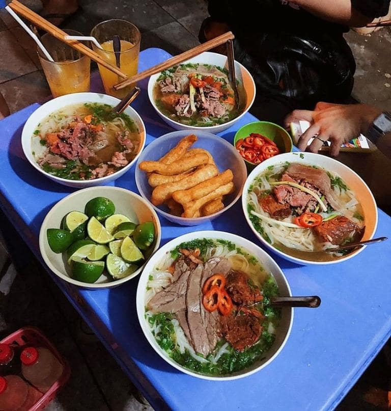 Savor the delicious late-night street food, from pho to local snack specialties - Hanoi's Nightlife