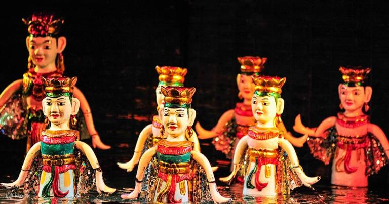 Thang Long Water Puppet Theatre showcases traditional water puppetry from the Red River Delta, with tickets from 100,000 to 200,000 VND. - Hanoi's Nightlife