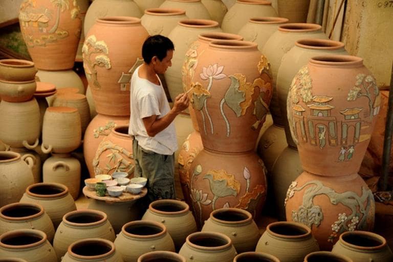 Bat Trang Village, a 500-year-old pottery hub, is a highlight of Hanoi's suburban attractions.