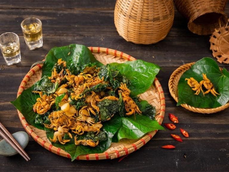 Crab roasted in lolot leaves combines the earthy aroma of betel leaves with the savory flavor of roasted crab.