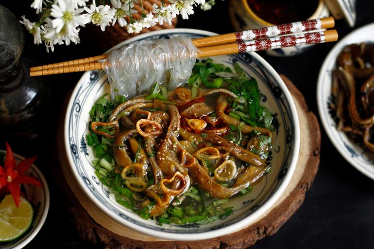 Eel vermicelli soup is a hearty and flavorful dish featuring tender eel and a fragrant, savory broth.