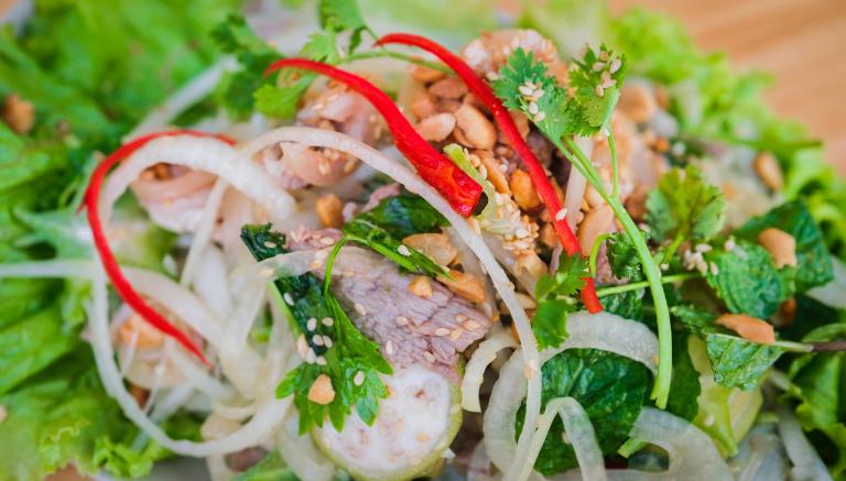 De Tai Chanh is rare goat meat, thinly sliced and cured with lime juice for a tangy and fresh taste.