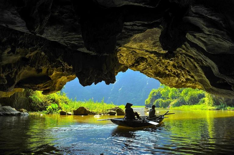 Pack sunscreen, water, a hat, and a camera to capture Tam Coc’s picturesque beauty.