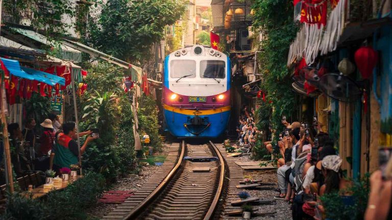 Hanoi’s narrow street, where history meets motion.