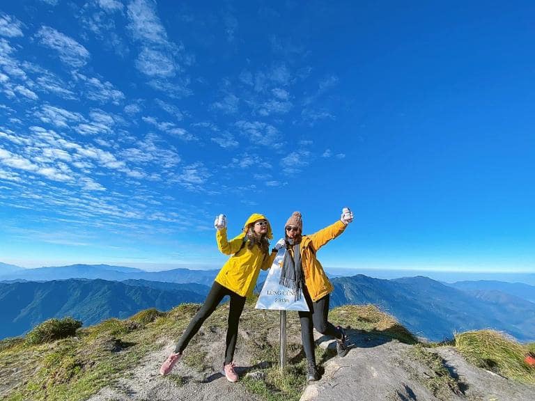 The Lung Cung trail features meadows, forests, streams, and panoramic summit views.