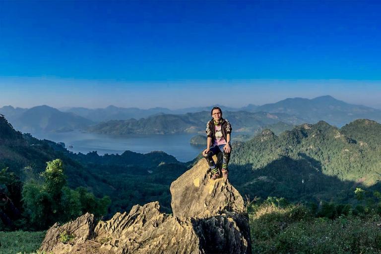 Checking in at Pu Luong Mountain Peak is a must for stunning views and photos.