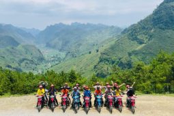Winding mountain roads cut through towering limestone peaks, setting the stage for an unforgettable Ha Giang Loop adventure.