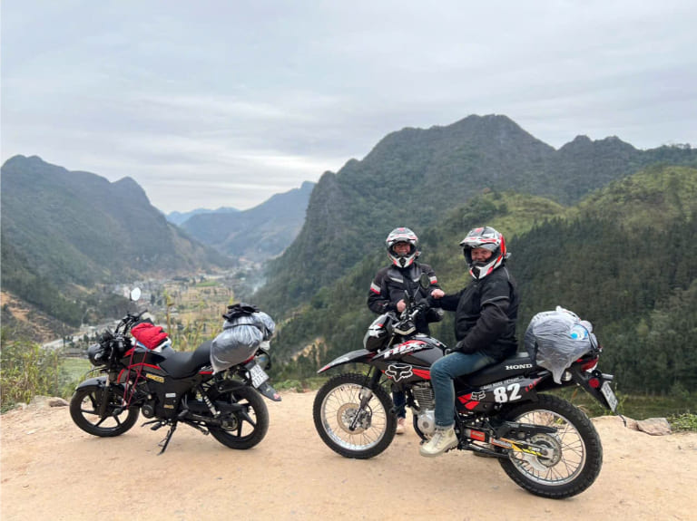 Ma Pi Leng Pass towers above the valleys, delivering one of the most dramatic road views in all of Vietnam.