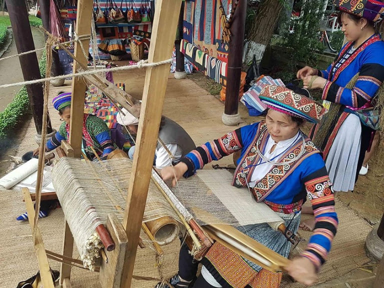 Lung Tam Village preserves the ancient art of H’Mong hemp weaving, passed down through generations.