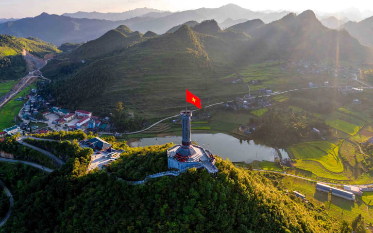 The Vietnamese flag waves proudly at Lung Cu Flag Tower, marking the northernmost point of the country