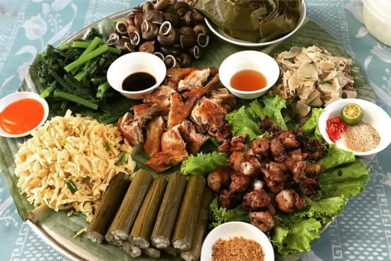 A simple but hearty local meal along the Ha Giang Loop, featuring fresh mountain vegetables and traditional Vietnamese dishes.