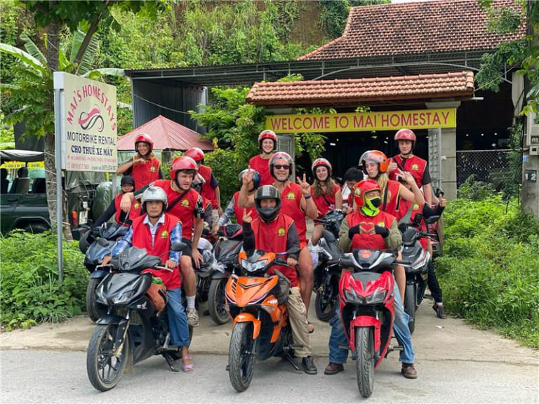 A fully geared rider on the Ha Giang Loop are essential for safety in the mountains.